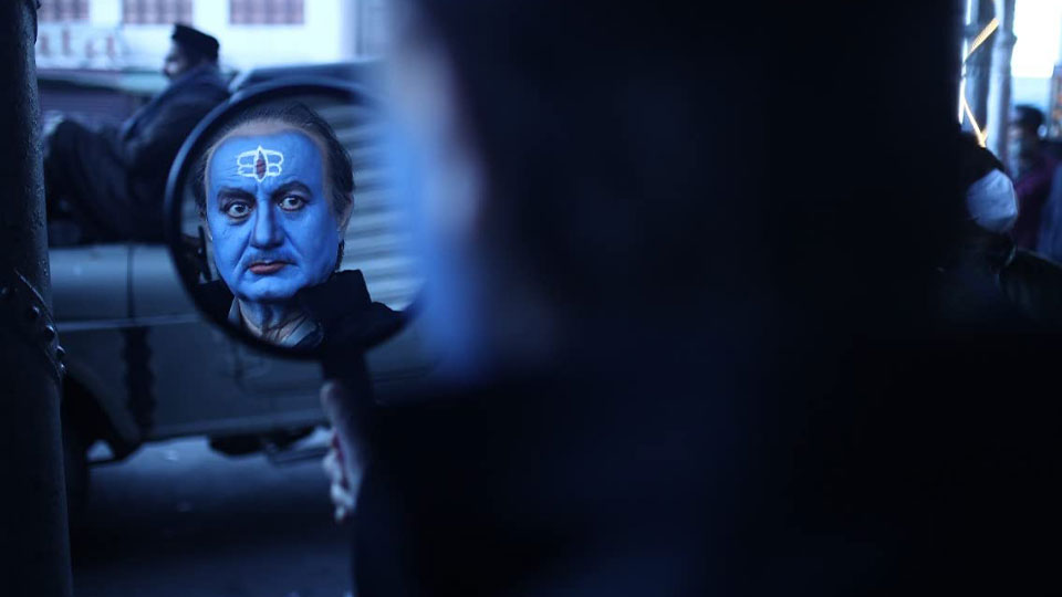 Pushkar Nath Pandit (Anupam Kher)