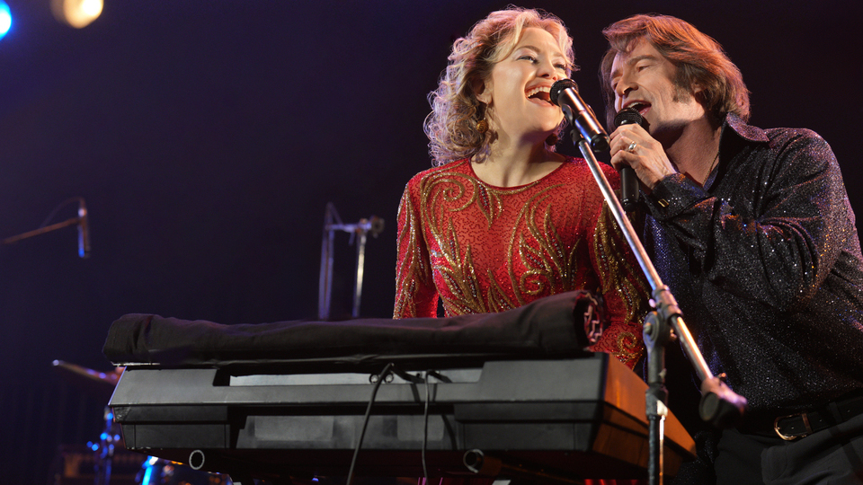 Claire (Kate Hudson), Mike (Hugh Jackman)